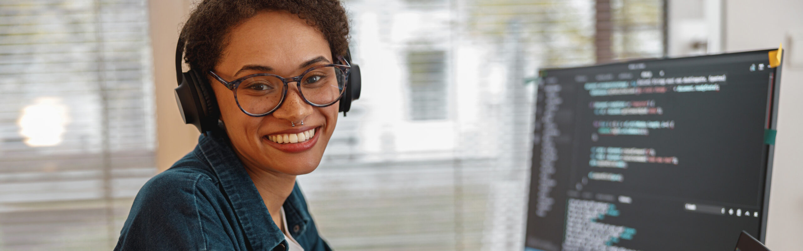 afro-american-woman-in-headphones-freelance-data-s-2023-11-27-05-35-11-utc-scaled