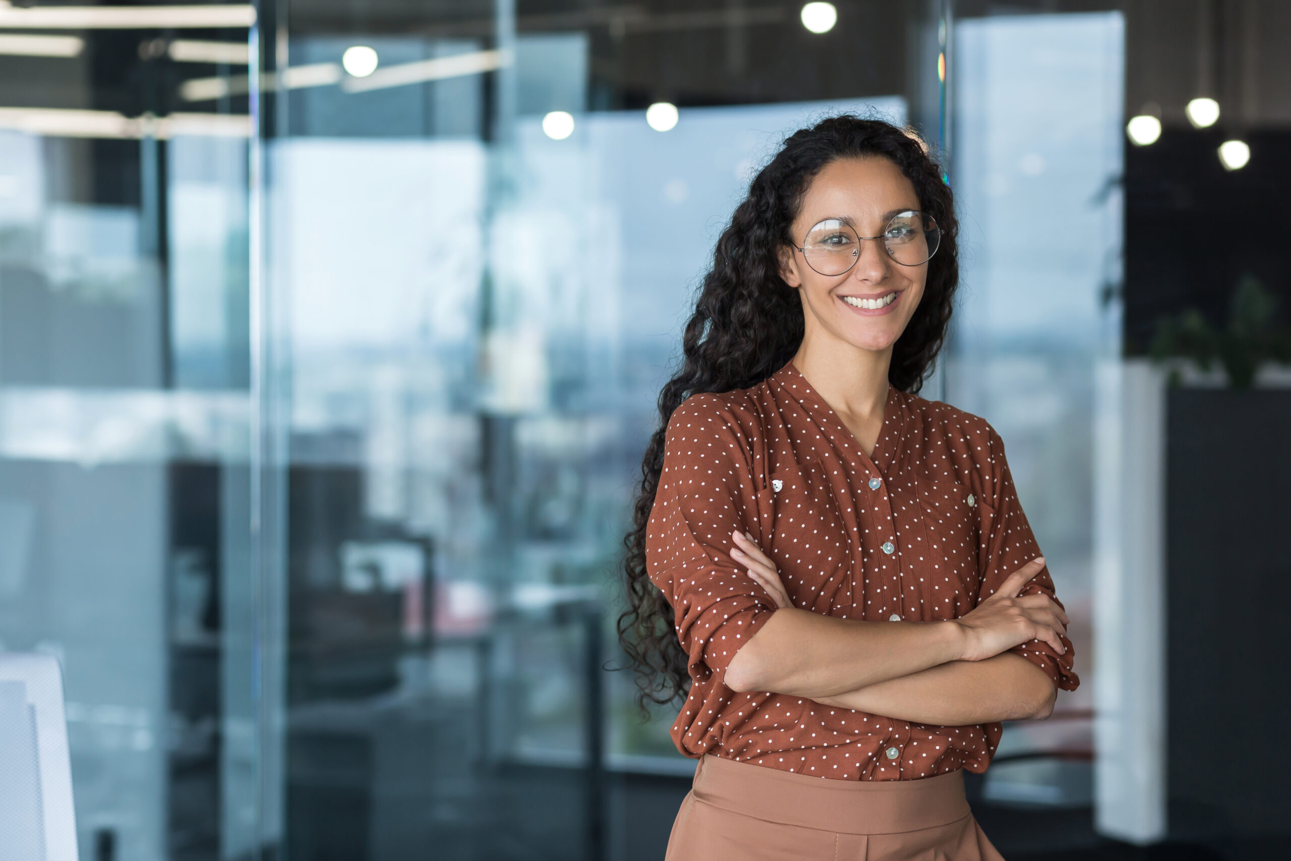 portrait-of-hispanic-woman-curly-latin-american-s-2023-11-27-05-25-45-utc-scaled